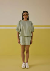 A Model Wearing Multicolor Poplin Under The Sunshine Organic Cotton Top, curated by Only Ethikal